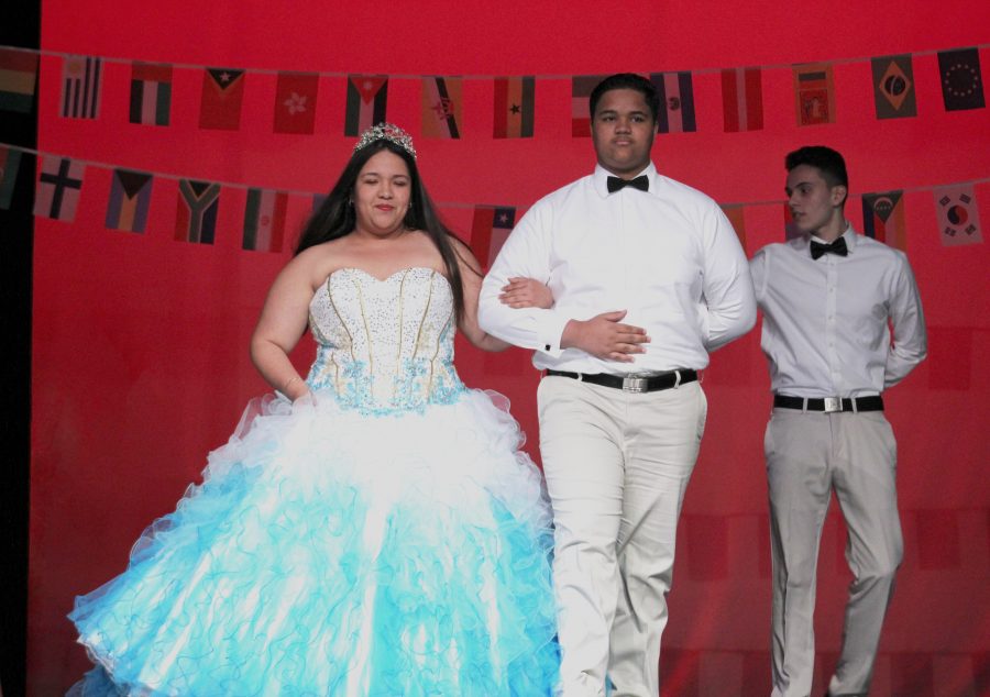 Saira Jimenez (12) and Victor Salcedo (9) performing a variation of a Quiñceanera dance.