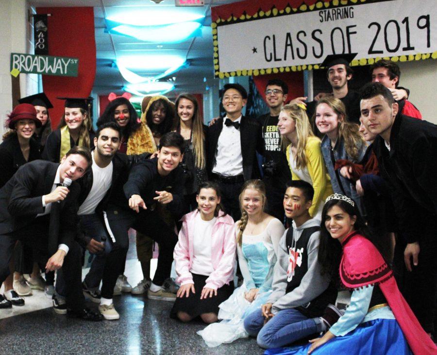 Senior+hallway+performers+commemorate+their+last+hallway+decoration+competition+with+a+group+photo.