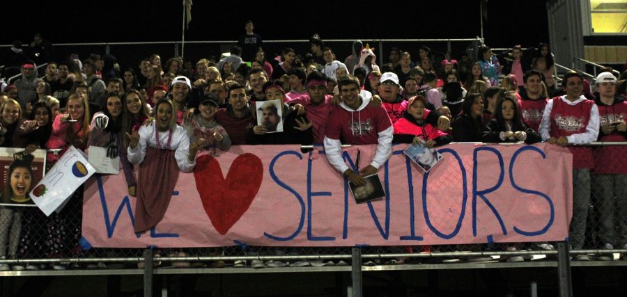 Students+dressed+in+pink+to+support+the+seniors+for+their+final+home+game.+Photo+by+Kayla+Cooper.