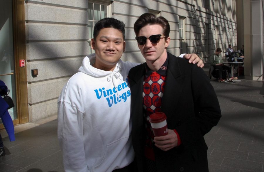 Junior Vincent Le takes photo with Drake Bell.