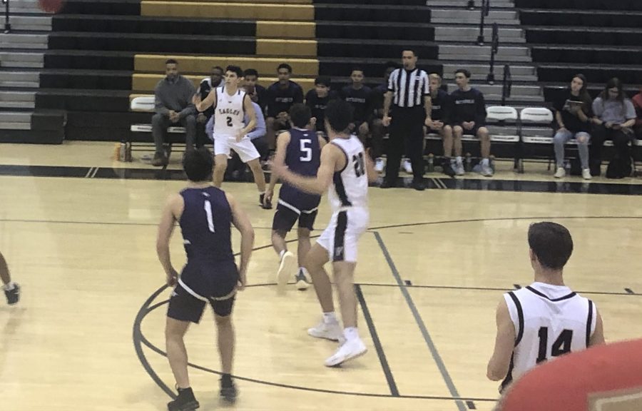 FHS varsity basketball team playing against Battlefield. 
Photo by Claire Wodack.