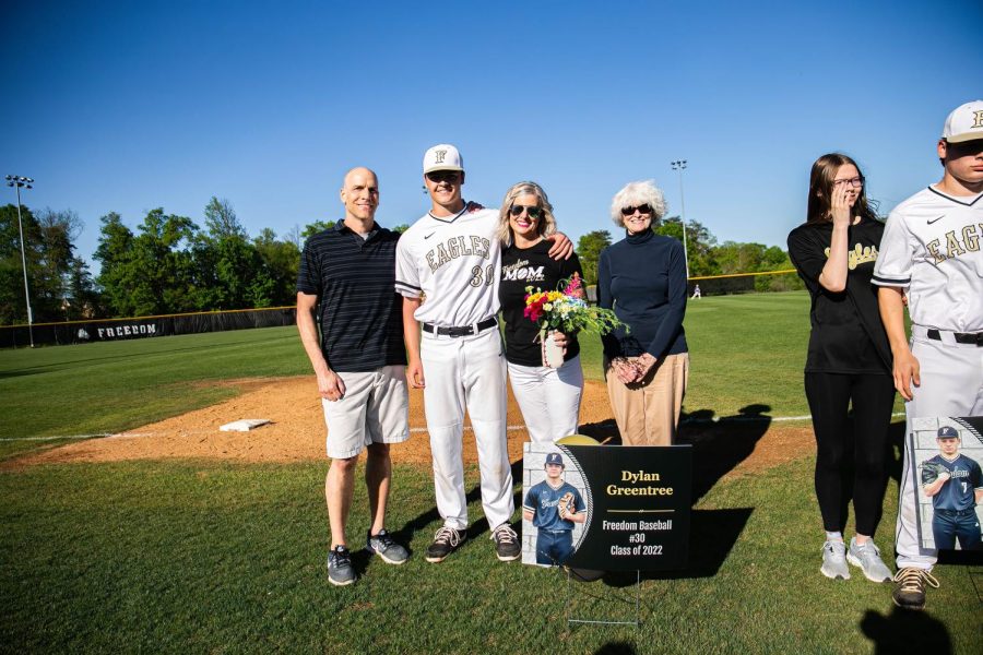 Senior Dylan Greentree posing with his family.