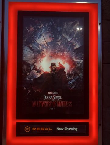 A movie poster of Doctor Strange 2 in front of the Dulles Mall theatre. [Photographed by Jackie Buktaw]
