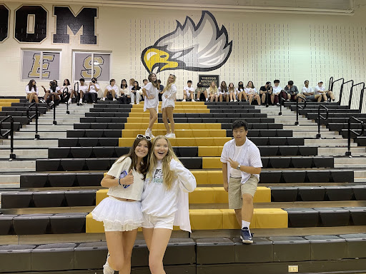 Sophomore class officers Liam Camet, Charlotte Skoug, Brogan Wyman, Ava Christopher, and Riley Walsh, and members of the sophomore class dressed in white for class color day.