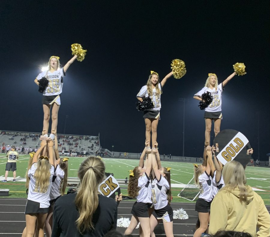 The Cheer Team at Freedom enjoying cheering during the Homecoming Game of the 2022 season. 