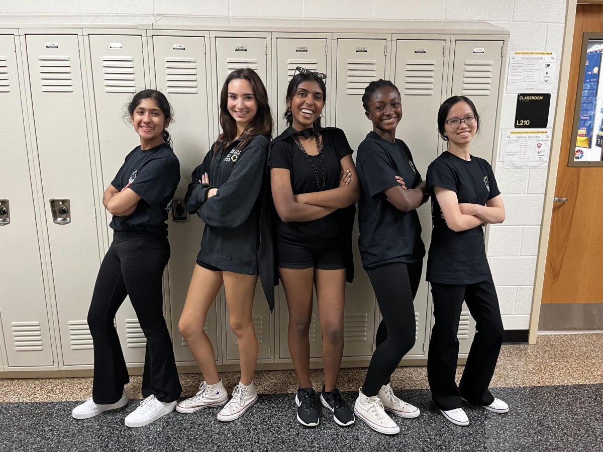 Pictured above from left to right are Surabhi Komanduri, Leena Fuleihan, Ann Cherian, Kendall George, and Keyra Ogura dressed up in black to represent the senior class for spirit week. Picture provided by Surabhi Komanduri.
