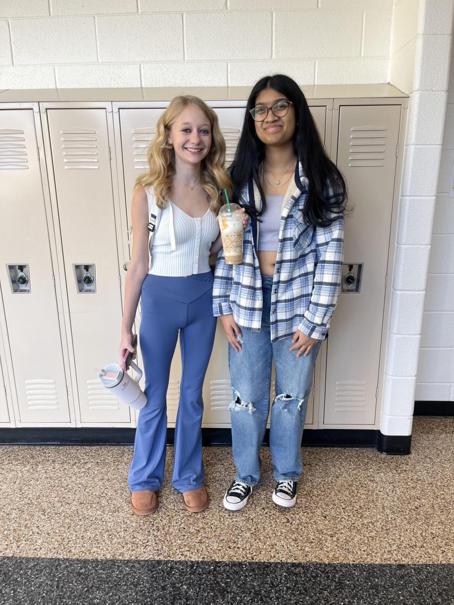 Pictured+above+from+left+to+right+are+freshmen+Bailey+Anne+Mullins+and+Vanika+Krishnaswamy+dressed+in+blue+and+white+for+Ice+Out+during+spirit+week.+