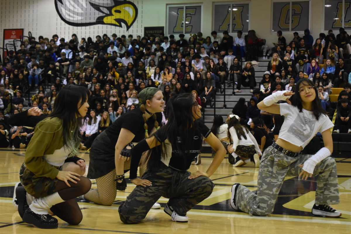 The K-pop Dance Club performs their dance routine in front of the FHS student body during the FHS Winter Pep Rally.