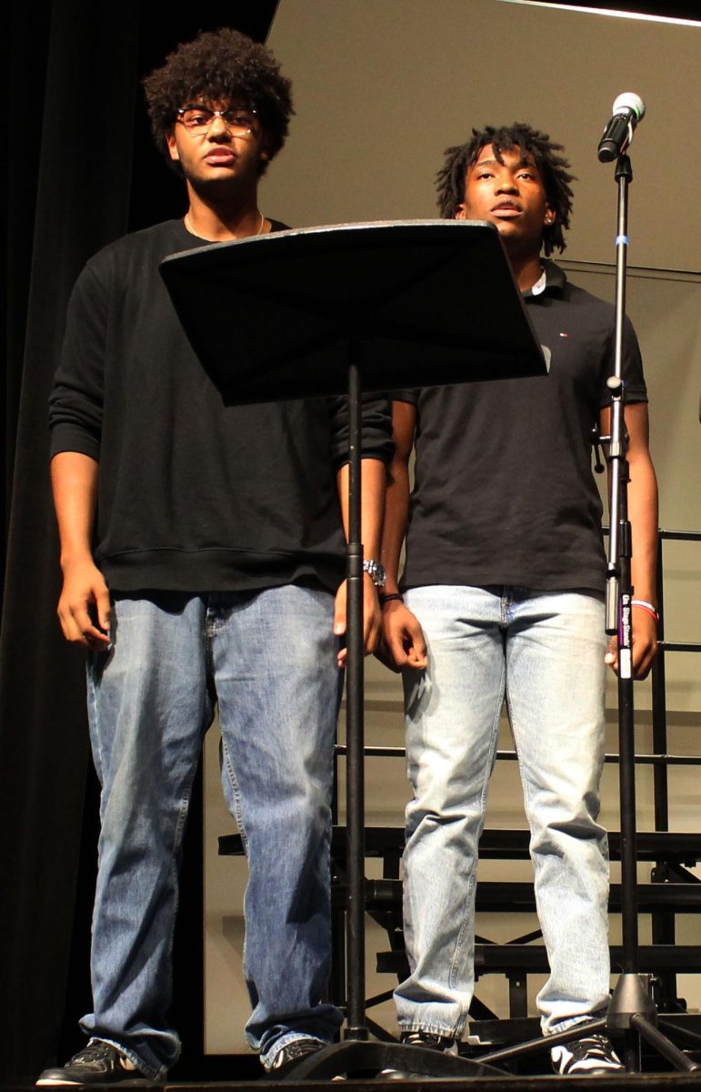 Bass Choir sings "Homeward Bound." Pictured: Aiden Clarke-Babou (Left) and Jeremiah Chery (Right).
